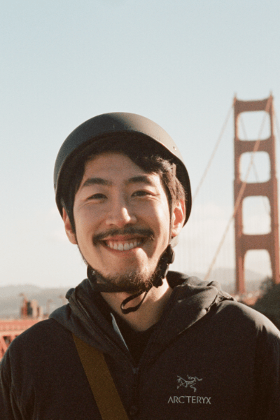 Me wearing a bike helmet on the Golden Gate Bridge